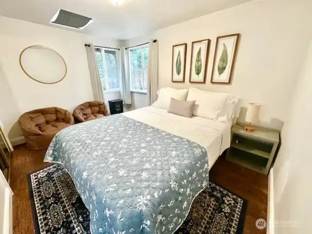 Bedroom 1 in the Cabin, big windows that bring in lots of natural light.
