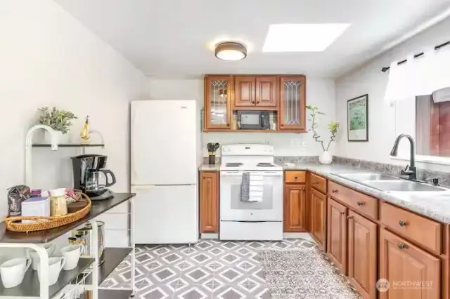 The Cabin kitchen, plenty of room to move around, cook, entertain or just hang out, lots of cabinets for storage.