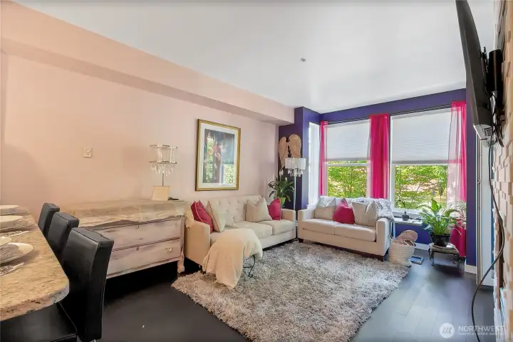Kitchen opens to the spacious light filled living room with access to patio & gorgeous fireplace to enjoy on a cold night!
