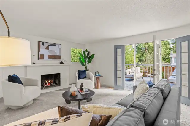 Spacious living area opens to deck and landscaped yard.