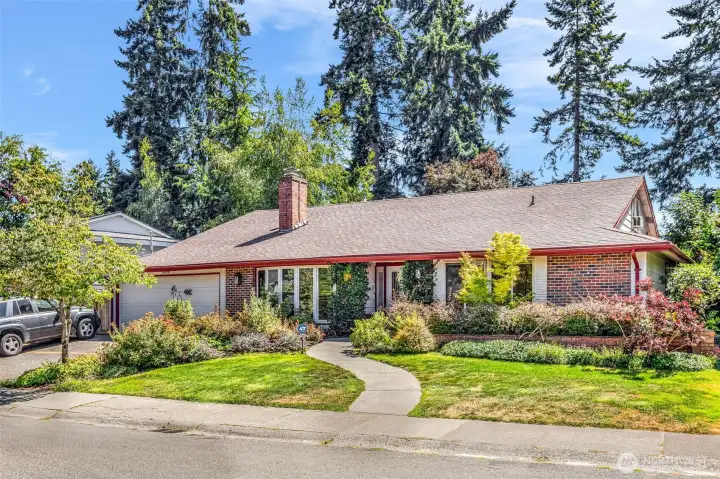 Beautiful landscaping in front and back yards