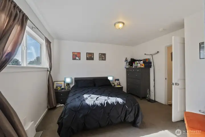 Bedroom on the upper level with walk in closet