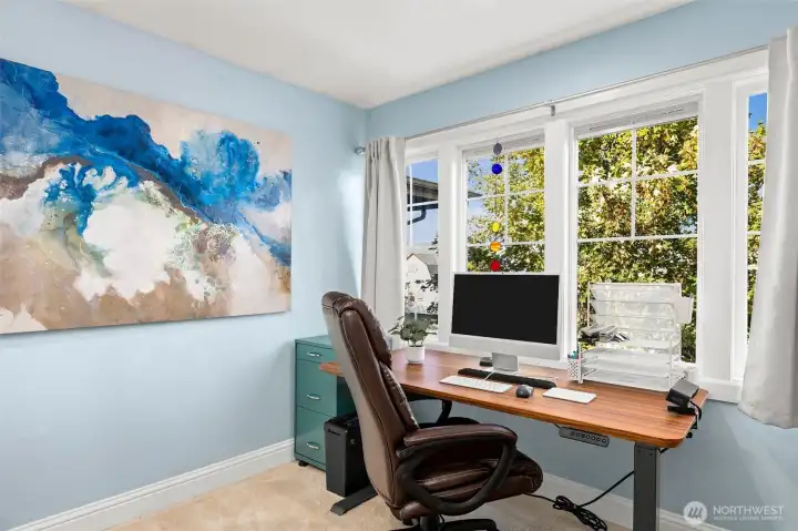 A view of the office space off the flex room-huge windows and the views are great!
