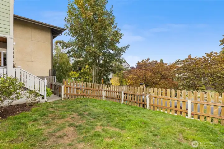 The front yard is fully fenced, and there is even a side yard fenced for a dog run!