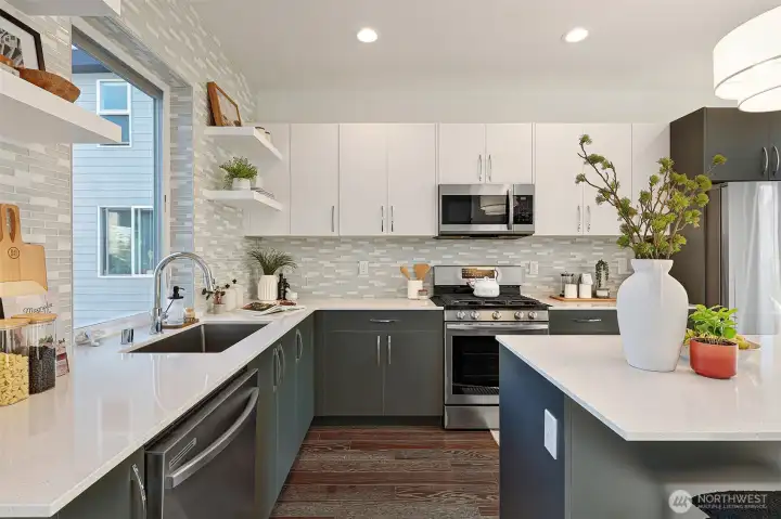 Lots of cabinet and counter space, in this dreamy kitchen.