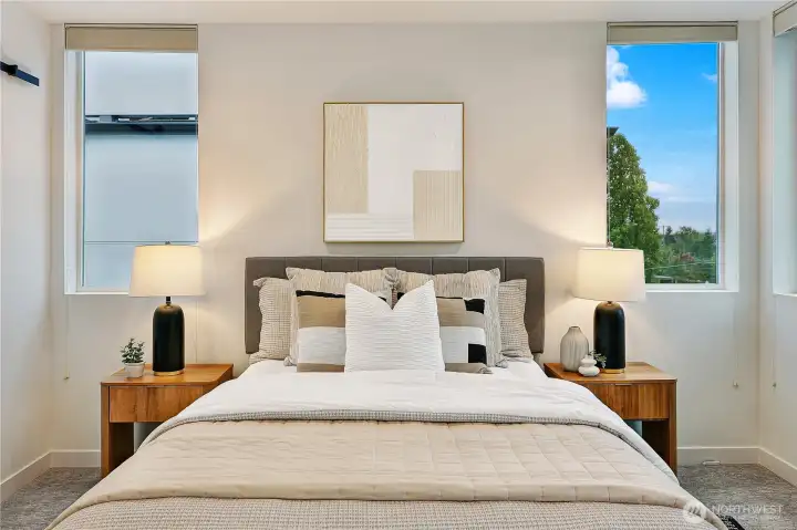 Primary Suite is spacious and easily fits a king size bed.