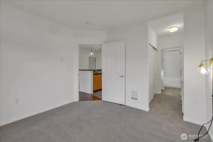 Primary bedroom is light and bright, has ensuite bath and large closet.