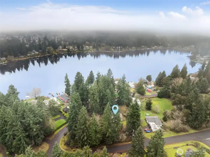 From above you can see exactly where this home sits, directly across from Pattison Lake and surrounded by well cared for waterfront properties. There’s something nice about a neighborhood where people tend to invest in their surroundings, it shows up in how everything looks and feels day to day. You get the scenery and atmosphere without the shoreline upkeep, and when you want the water, the public boat launch is only about five minutes away.
