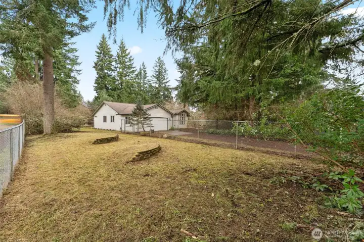 Imagine all the fun you can do in this fenced side-yard area.