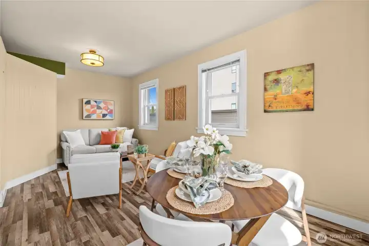 Looking from breakfast bar area into dining and living area