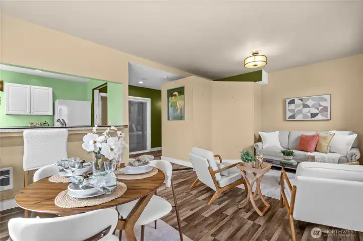 Living, dining, and kitchen from corner of the room