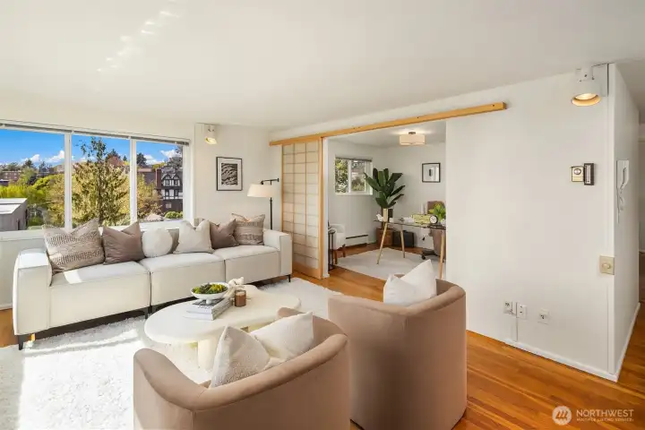 The shoji screen wall open — the 2nd bedroom seamlessly becomes part of the living space. Use it as an office, den, library, or guest room, then slide it open to expand the living area whenever you want. This flexibility is rare and one of the most unique features of this home.