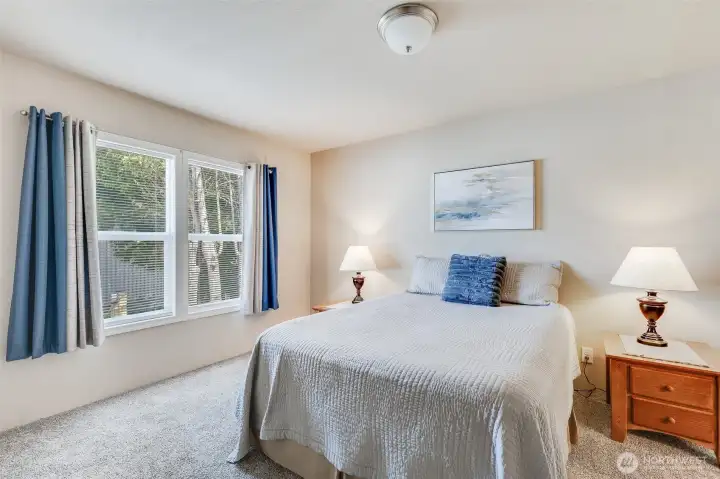 Soft, plush carpeting paired with energy-efficient double-paned vinyl windows creates a comfortable, quiet interior.