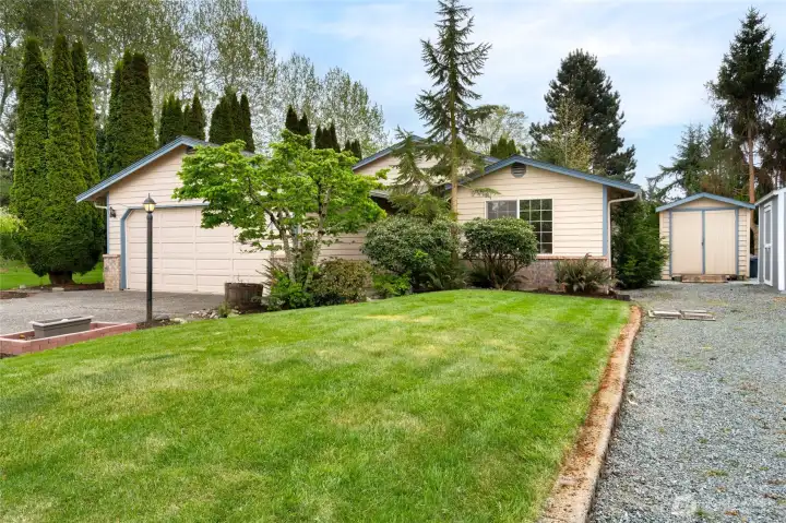 In addition to the aggregate driveway, there’s dedicated space for RV, trailer, or boat parking.