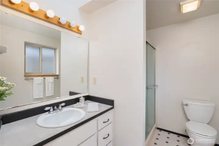 The primary’s ensuite 3/4 bathroom.