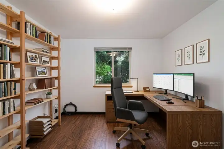 1st Bedroom or office space with built-ins, shown here virtually staged.