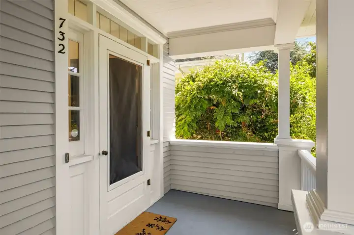Covered front porch keeps you and your guests dry