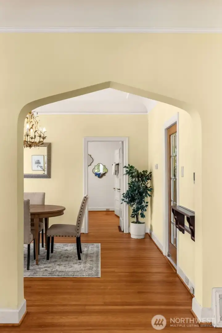 Vintage details like this archway is repeated throughout the home