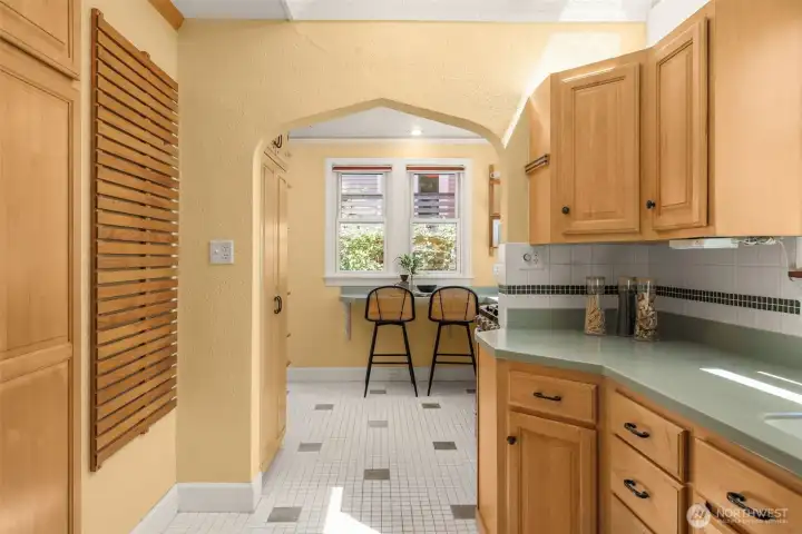Kitchen combines function with beauty - notice the slatted wall accent and come ready to bring your creative ideas to this space!