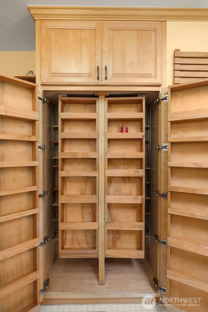 This custom cabinet extends even further - you must come see it for yourself!