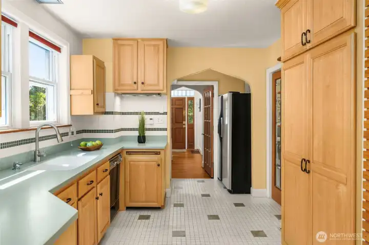Heated floors round out the amenities in this cheery kitchen