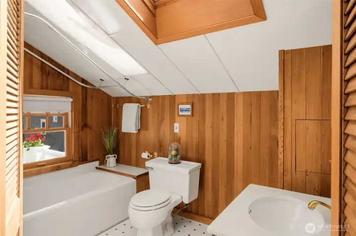 Full bath, full of charm on the third floor