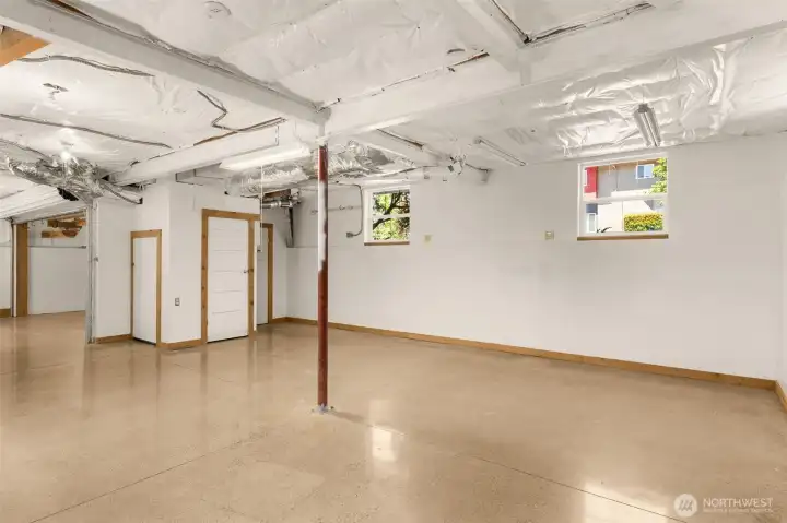 Basement features 9-foot ceilings, so rare in homes of this vintage; floor is radiant heat-ready (just add the boiler)
