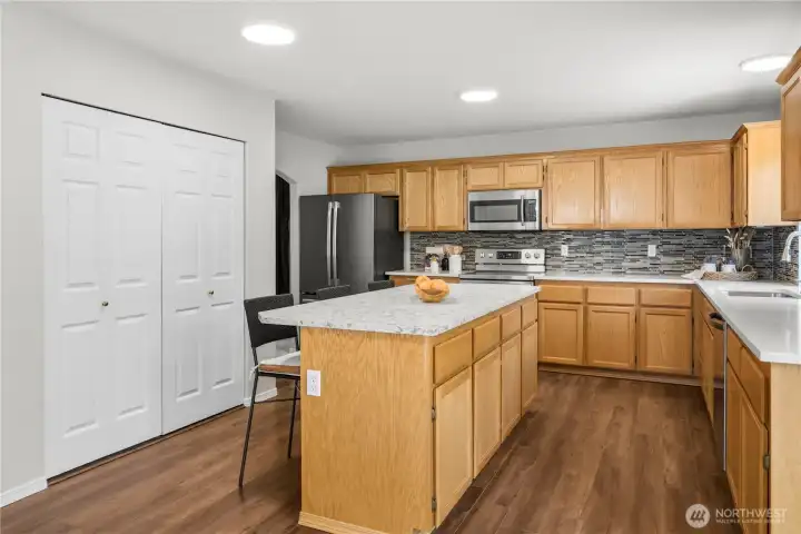 Enjoy the convenience of a large pantry offering plenty of room for groceries, small appliances, and kitchen necessities.