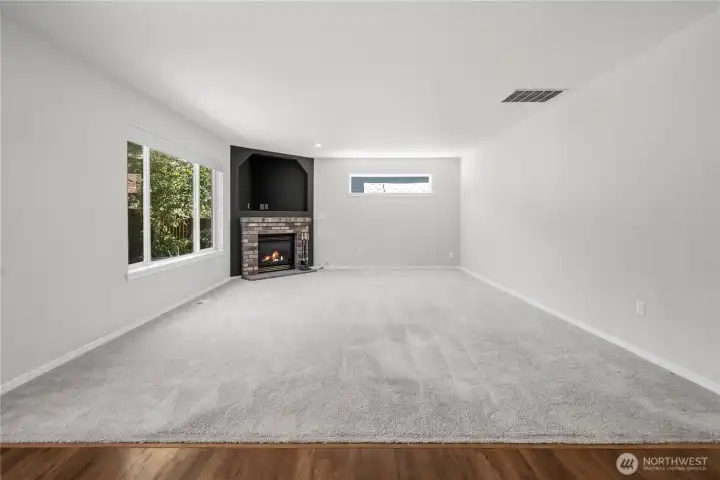 A stylish gas fireplace creates a cozy focal point for gatherings and quiet nights at home.