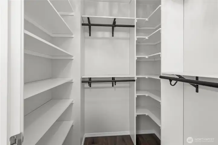 Generous closet space featuring built-in storage to keep everything organized and within easy reach.