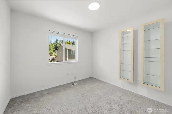 Well-appointed additional bedroom featuring a comfortable layout and room to make it your own.