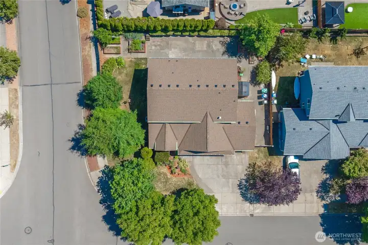 RV parking and a storage shed offer added convenience and functionality.