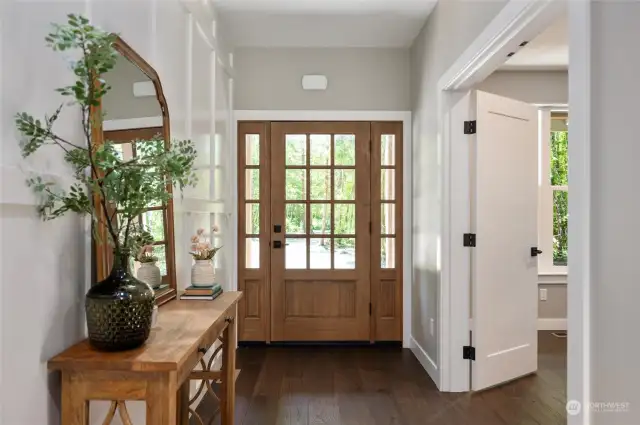 Enter into the home with vaulted ceiling. A den/office is to the right.