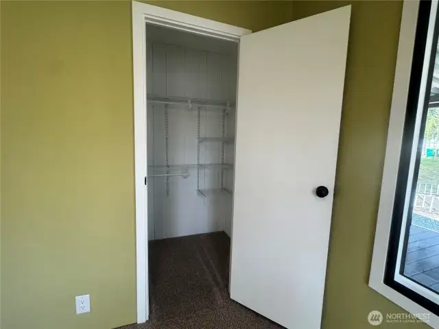 The primary bedroom's walk-in closet.