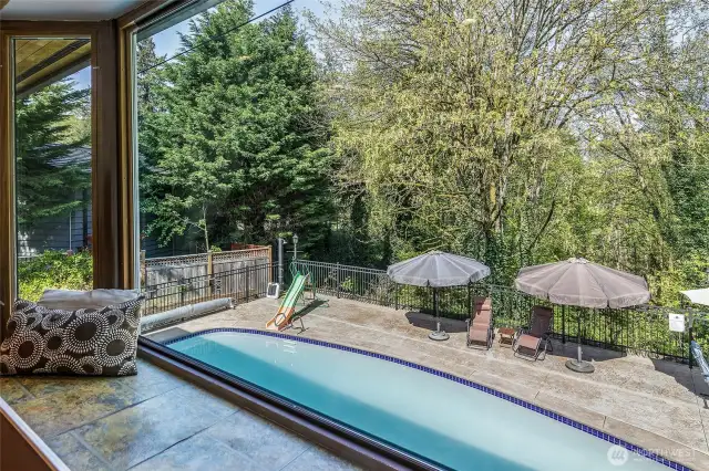 Enjoy Views of the Pool and Green Belt from the Living Room Window Seat