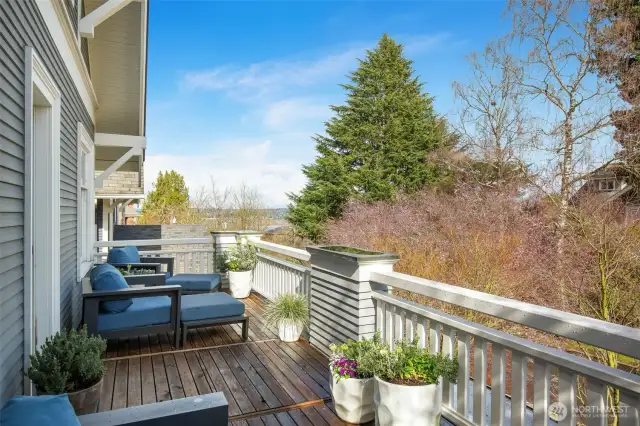2nd floor balcony offers quiet views of Lake Washington and Mt. Baker
