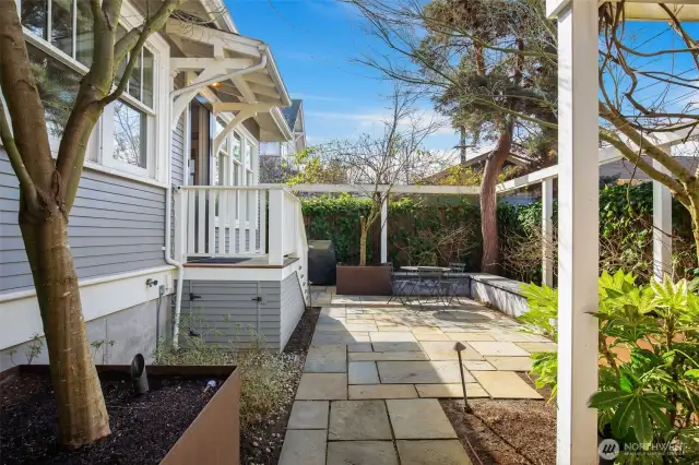Once outside this perfectly sized backyard garden is great for hosting summer dinners.