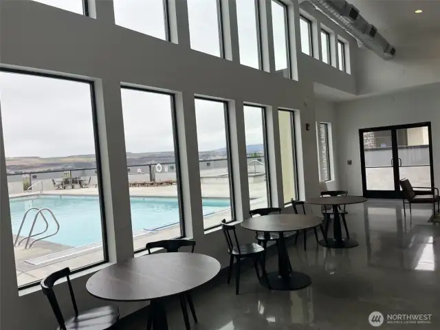 Inside sitting with gorgeous view of the pool and river