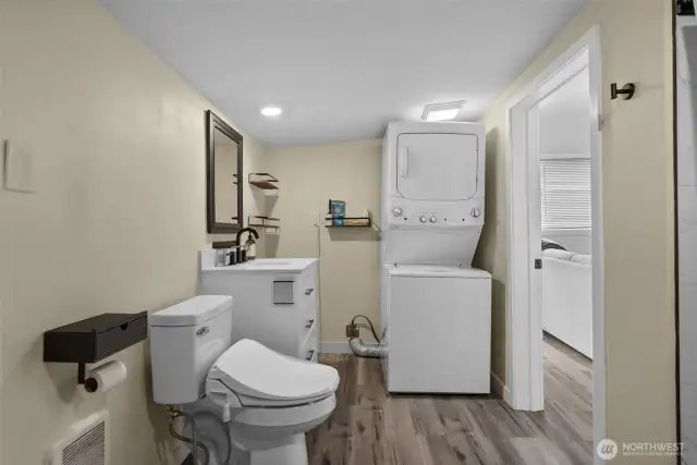 Ensuite bathroom and laundry combo.