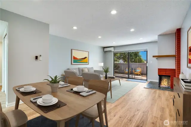 View of dining and living room area showing Virtual Staging.