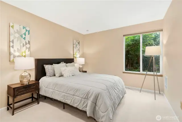 2nd bedroom looking into private backyard.