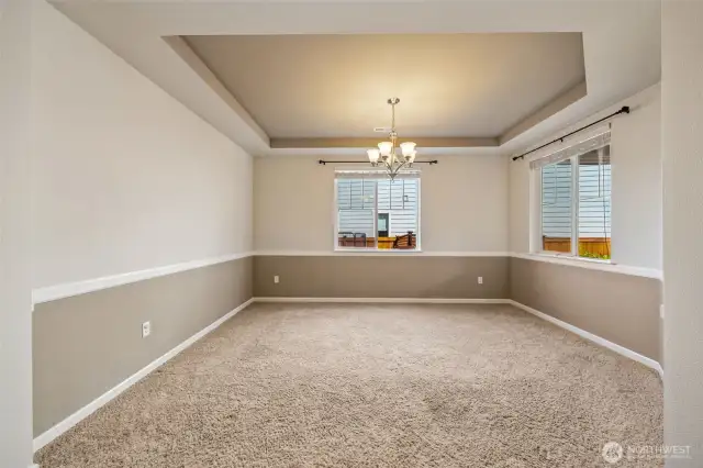 Formal dining room off entry