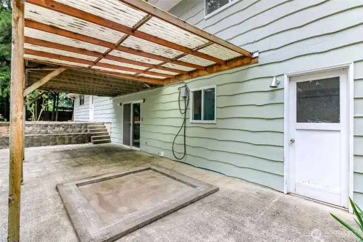 COVERED PATIO, access to lower level from garage and laundry/util room