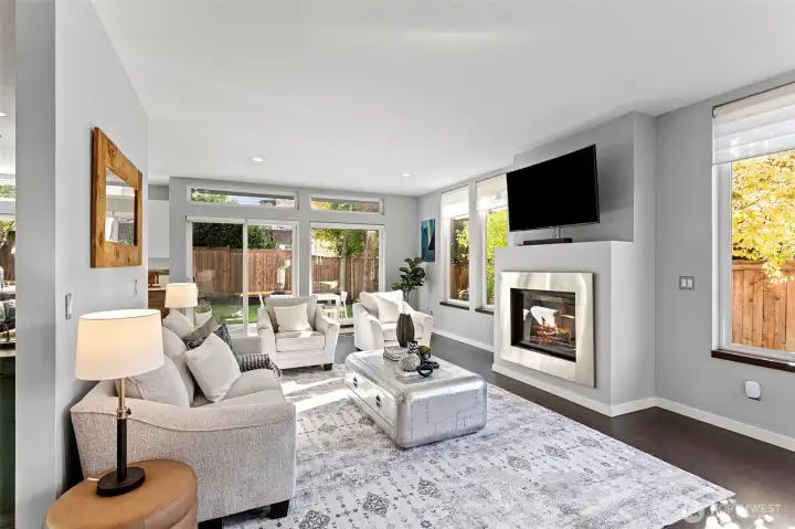 Dazzling sun-drenched living spaces on the main with easy access to the backyard!