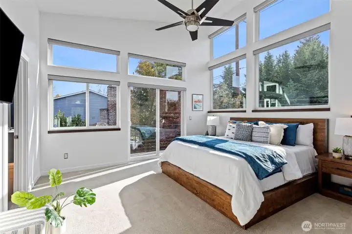 Primary Bedroom complete with electric blackout blinds for a great night's sleep!