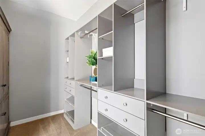 Primary bedroom walk-in closet complete with organizers!