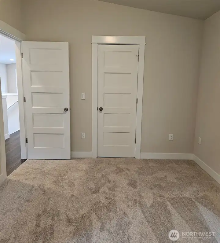 Main level primary wit door to shared bath