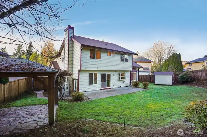 Backyard has gorgeous landscaping and a waterfall! Gazebo was installed recently and could be perfect for outdoor dining or a hot tub??