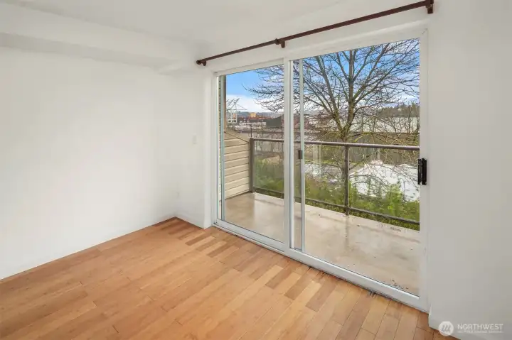 The sweet east facing balcony offers city views