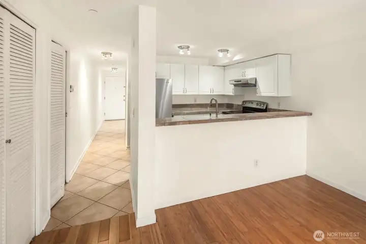 The closets along the left all house the full size washer/dryer and provide pantry space.